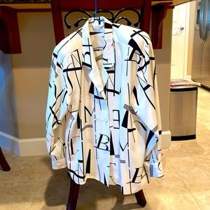 Vintage women’s shirt with shoulder pads